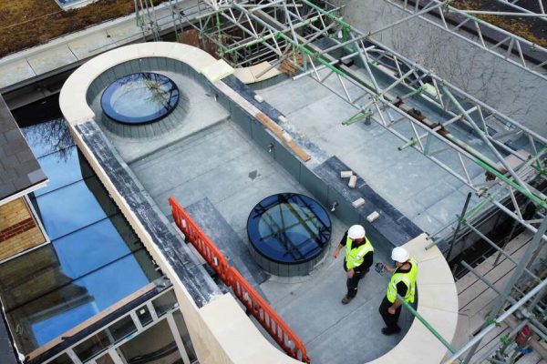 Circular roof windows on a flat roof