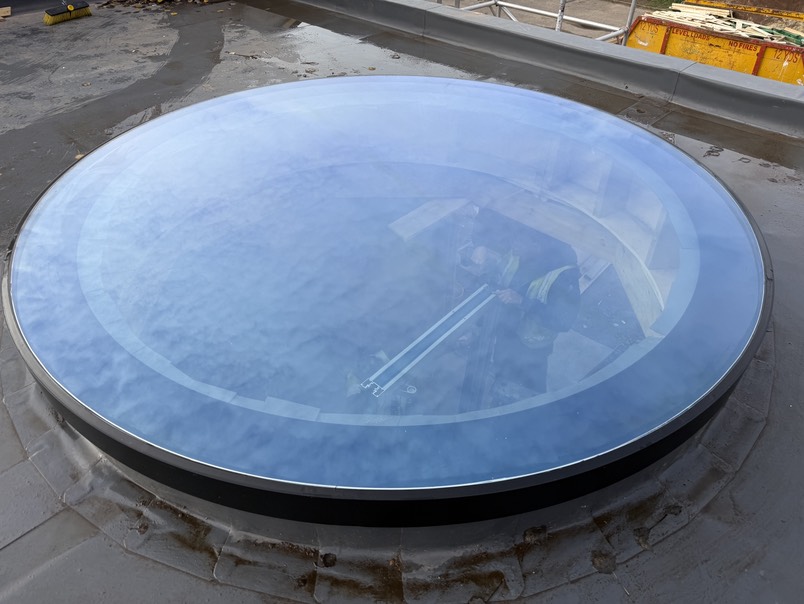 very large flat glass on roof